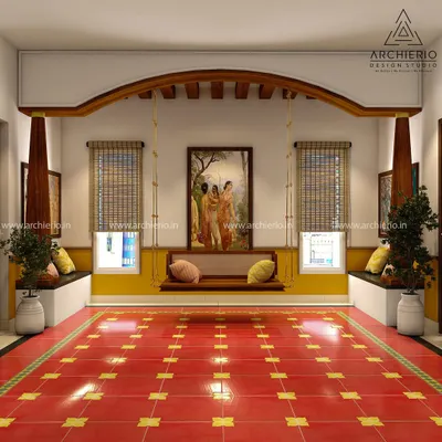 This space is a tribute to traditional South Indian architecture. The vibrant red oxide flooring, wooden swing, and classic pillars create a courtyard-like feel that is both timeless and elegant.