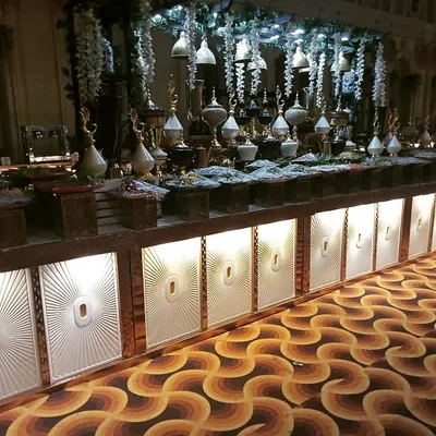 For large scale events like weddings and corporate functions, we create stunning, illuminated counter setups that make the food display a true centerpiece.