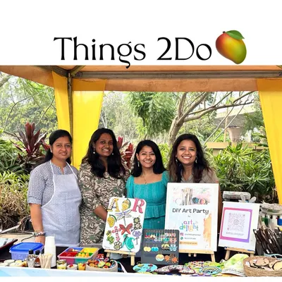 Our stall at the Things 2 Do event was buzzing with creativity. Here I am with my amazing co-artists, surrounded by handmade candles, dot mandala art, and personalized crafts.