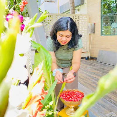 This is me in my element, doing what I love most. Putting all my heart and soul into every detail, like arranging these fresh flower petals, is what turns an event into a truly happy happening.