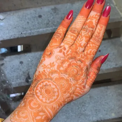 This is the result you can expect from my natural henna paste after 48 hours. The color develops into a deep, rich orange-brown, and this photo has not been edited or filtered.