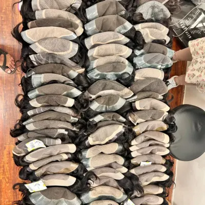 For my male clientele and salon partners, I keep a large stock of hair patches and systems. This image shows a variety of bases, including Australia, Miraj, and full lace, ready to be shipped at wholesale prices.