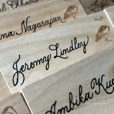 A detailed look at the elegant script on a wooden block for Diageo's Godawan. The texture of the wood required a steady hand and specialized technique to achieve this clean, engraved look.