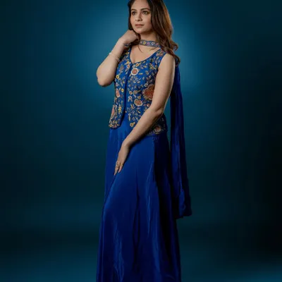 For this model's portfolio, I styled a royal blue Indo-Western outfit featuring a velvet skirt and an embroidered jacket.