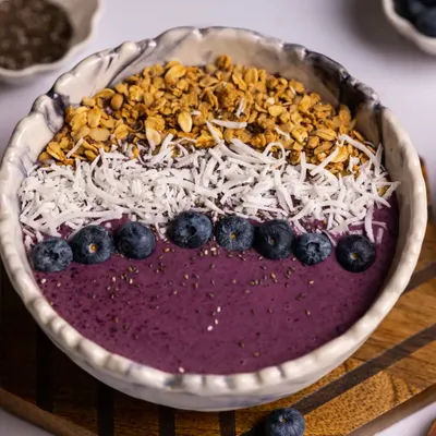 Monday motivation to eat a healthy breakfast. This Blueberry Smoothie Bowl is packed with antioxidants and looks as good as it tastes. The toppings are arranged to create a beautiful, textured finish.