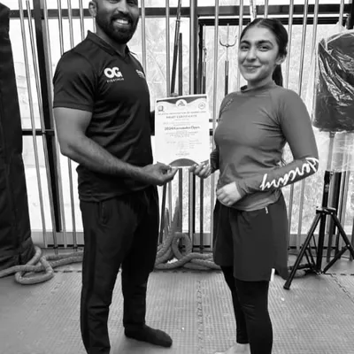 I am proud to present a certificate of achievement to Yusra Akef Siddiqi, a multiple-time National MMA and Grappling Champion. She is a testament to what dedication and hard work can achieve.