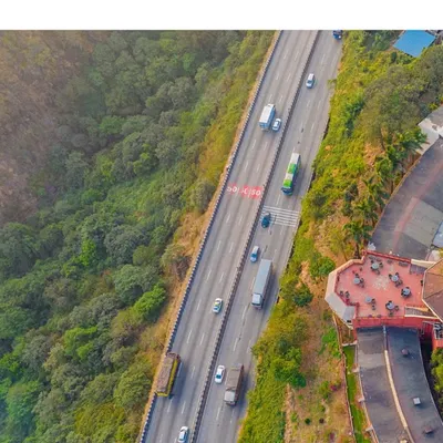 An aerial view of the Mumbai-Pune expressway, on the way to a stunning destination wedding in Lonavala. We handle all the logistics, no matter the location.