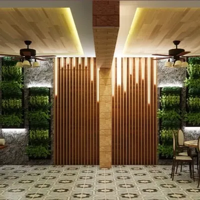 A 3D render of an upcoming project in Bhiwandi. This concept for a semi-outdoor space features vertical gardens, a dining area, and a traditional swing, showing how we plan to blend nature with comfortable living.
