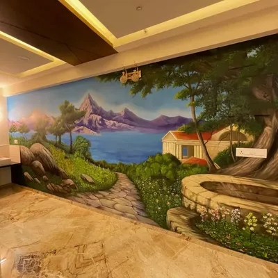 A beautiful landscape mural painted for a residence at Land Trades Solitaire in Mangalore. This artwork creates a window to a serene, imaginary world, making the room feel larger and more peaceful.