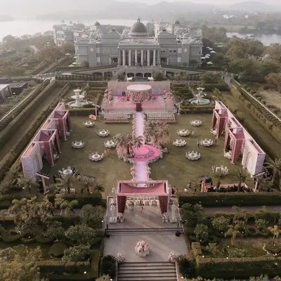 An aerial view of the magnificent Raffles Udaipur, set up for a grand wedding ceremony. We manage the entire layout and logistics to make the most of such spectacular venues.