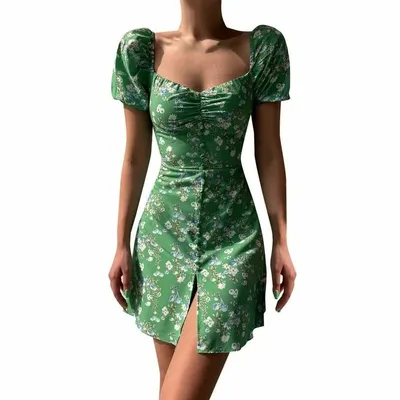 A clean, studio-style shot of my green floral daytime dress. This image clearly shows the flattering cut, sweetheart neckline, and button-front detail.