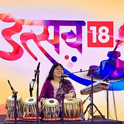 Performing with my fusion band at the News18 Diamond States Summit in Maharashtra. For corporate events like this, I curate special performances that are both entertaining and culturally enriching, showcasing the vibrant rhythms of India.