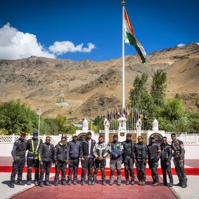 A moment of pride and reflection at the Kargil War Memorial. Leading 14 of our riders on the Ladakh expedition was a special experience, and this picture, with the Indian flag flying high, is a favorite for all of us.