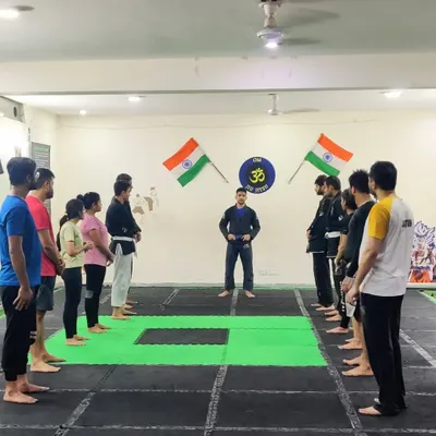 This is what discipline looks like. A group of dedicated students listening intently before a training session. Showing up is half the battle.