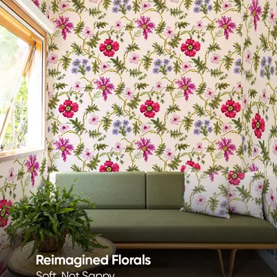 Floral wallpapers don't have to be sappy. This reimagined floral design uses a vibrant and soft pattern to bring life to this room, creating a fresh and modern look that is full of personality.
