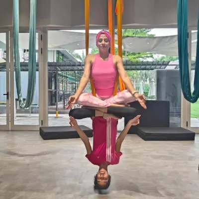 Another angle of the beautiful lotus reflection pose. As a mentor, I guide students to find their balance and trust themselves, resulting in stunning and serene moments like this one on the aerial hammock.