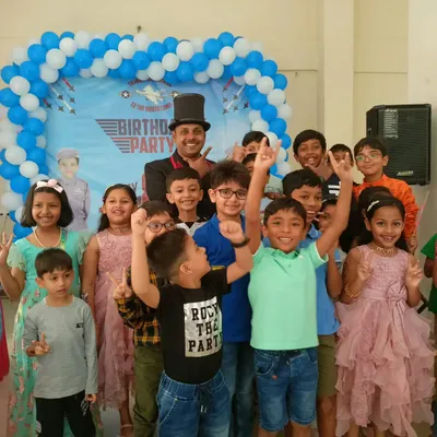 Look at these excited faces. This is why I love what I do. A group photo with the kids after a super energetic 'Top Gun' themed birthday party.