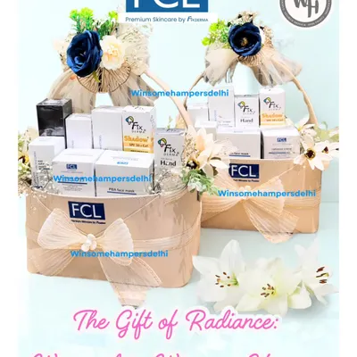 A pair of luxurious skincare hampers created for FCL and Fixderma. Each basket is overflowing with their premium products, adorned with blue and white floral arrangements to match the brand's clinical yet elegant aesthetic.