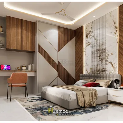 This 3D view of a bedroom design shows a fully integrated space, complete with a custom wardrobe, a statement headboard, and a dedicated study desk with overhead storage, perfect for a modern apartment.