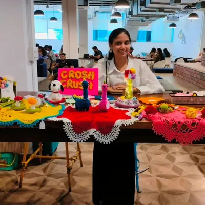 A photo of me at my very first exhibition. It was a huge milestone, and I was so excited to share my handmade creations with everyone.
