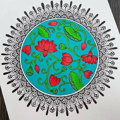 A beautiful fusion of Pichwai art and mandala design. The center of this piece features a vibrant, traditional Pichwai-style lotus painting, which is then framed by a classic black and white mandala border.