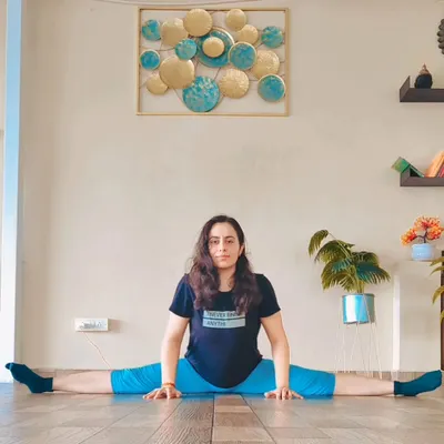 Samakonasana, or the Middle Splits, is a deep stretch for the inner thighs and groin. Achieving this pose requires patience and consistent practice to gradually open the hips.