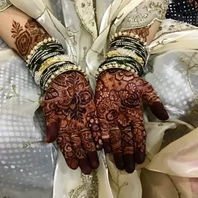 This is the result I work for. A stunningly dark and even henna stain on a bride's hands, showing the quality of my natural, chemical-free paste.