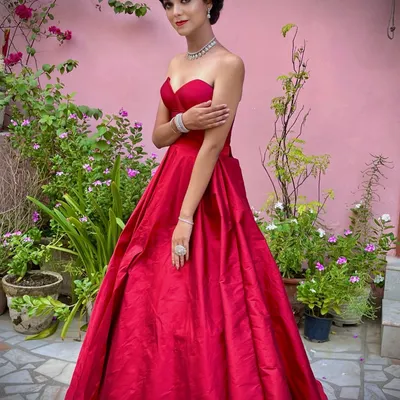 For a truly glamorous event, nothing beats a classic red ball gown. I crafted this piece with a sweetheart neckline and a full, flowing skirt that makes a grand entrance. It’s the kind of custom western gown that ensures you are the center of attention.