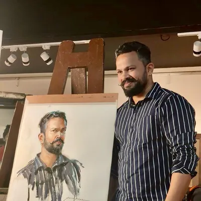 Here I am with my self portrait, created as a live demonstration for Hina Bhatt Art Ventures. It's always a great experience to paint in front of an audience.