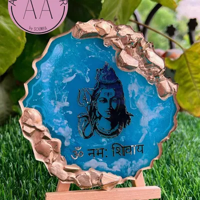 A powerful 'Om Namah Shivay' mantra frame in a striking blue marble resin with a gold geode edge, perfect for any Mahadev devotee.