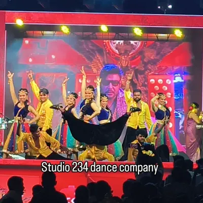A dynamic moment from our performance at 'The Devil' movie launch event. The choreography includes intricate prop work and expressive group formations, showcasing our team's skill as professional stage performers for corporate functions.
