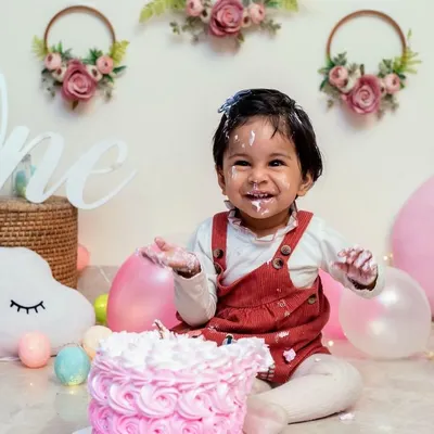 The perfect cake smash moment. We create a fun and safe environment in our studio for your little one to explore and enjoy their first birthday cake, resulting in photos filled with genuine laughter.