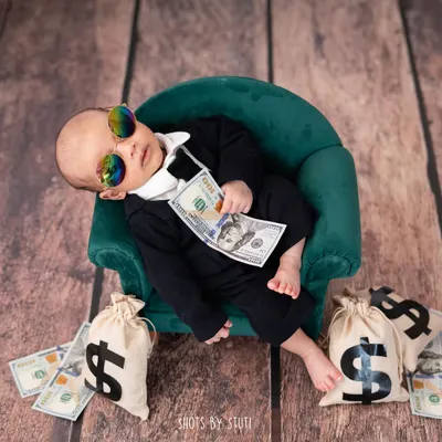 Introducing the real Boss Baby. This little guy is already in charge. Themed shoots like this are a fun way to add humor and personality to your newborn gallery. All poses are done with the utmost safety and support for the baby.