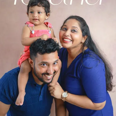 Together is the best place to be. I love this playful pose with the little one enjoying a ride on dad's shoulders. It’s full of joy and perfectly captures the fun of family life.