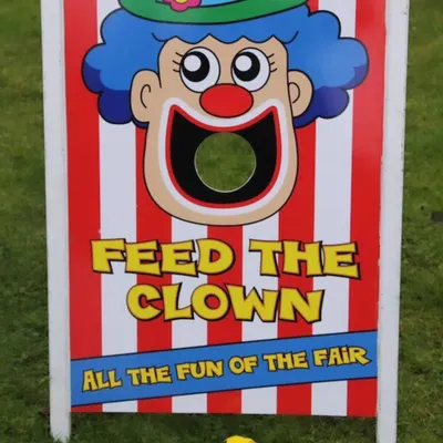 My 'Feed the Clown' game stall is a classic carnival attraction that I can set up in your backyard or party hall. It’s a simple game of skill that provides a fun challenge for both kids and adults, bringing a fairground atmosphere to your event.