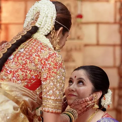 A truly precious moment. Here I am with Sonal on her wedding day. Being a part of these personal milestones and creating the outfits for them is the most rewarding part of my job. Her bridal blouse was a labor of love.