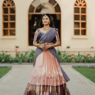 The grace of a traditional langa voni is unmatched. My beautiful bride Brunda looks radiant in this custom-made piece, created by upcycling a classic silk saree.