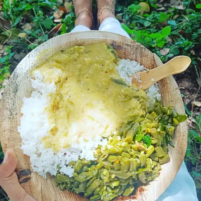 A simple, nourishing meal of rice, vegetables, and legumes served on a leaf plate at the Isha Yoga Center. Eating in this way, close to nature, makes you more sensitive to the food you consume and how it affects your system. It is a practice in mindfulness itself.