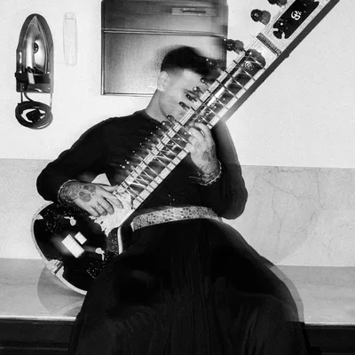 The 'Sitar Sorcerer' look. This black and white motion-blur photo captures the magical and modern energy I bring to my music and style.