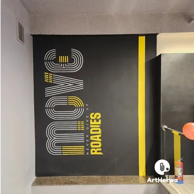 Bold typography for Roadies Gym, featuring the word "MOVE" in a retro, striped style. This design is clean, powerful, and perfectly suited to motivate people in a fitness environment.