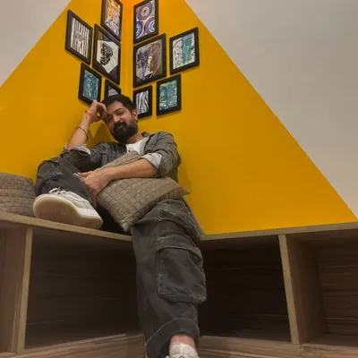 Just taking a moment to relax and smile in the studio space.