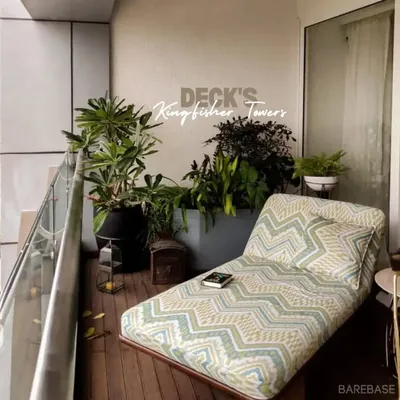 A custom chaise lounge we designed for a deck at Kingfisher Towers. The patterned upholstery and comfortable cushions make this the perfect spot for reading and relaxing with a view.