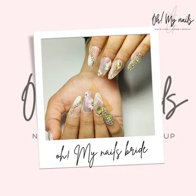 The ultimate bridal fantasy. This set features intricate white lace detailing, 3D floral accents, and a full nail covered in dazzling crystals for a truly show-stopping wedding day look.