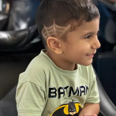 Who needs a superhero mask when you can have a spider-web haircut? I love creating fun designs like this to make haircuts an exciting experience for my youngest clients.