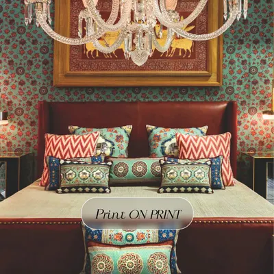 This bedroom is a masterclass in maximalism. The walls are covered in a busy floral pattern, which serves as a backdrop for more patterns on the pillows and a traditional painting, creating a rich, layered look.