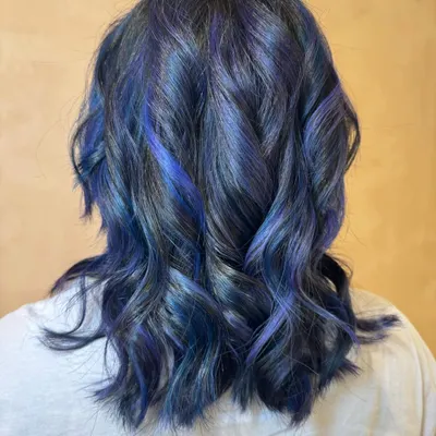 Sapphire strands and daring dreams. This wolf cut with bangs is a major transformation, paired with a bold blue color. (No filter)