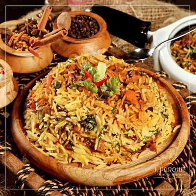 My Vegetable Biryani is a fragrant and flavorful one-pot dish, layered with long-grain basmati rice, mixed vegetables, and a blend of aromatic spices. It's a classic centerpiece for any Indian meal.