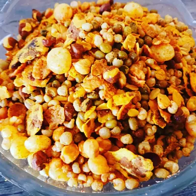 A crunchy and savory roasted mixture of grains, lentils, and cornflakes. A healthy, high-protein snack.
