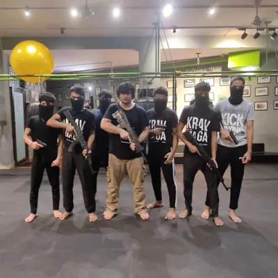 A group of students during an advanced weapon training module. My courses cover everything from unarmed combat to defense against firearms, preparing you for a wide range of potential threats.