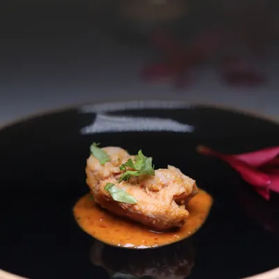 A single, perfectly plated bite. This appetizer showcases my focus on flavor, texture, and presentation, ensuring even the smallest dish makes a big impact.